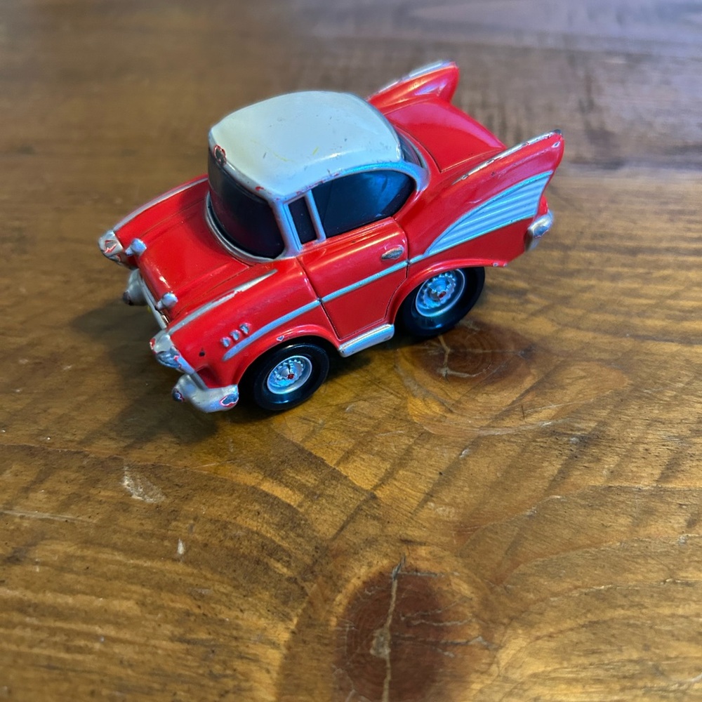 ERTL 1957 Chevy Bel Air Revie Push In Go Toy Car
Free Wheeling Vehicle as is